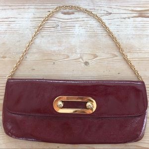 Hobo dark red clutch